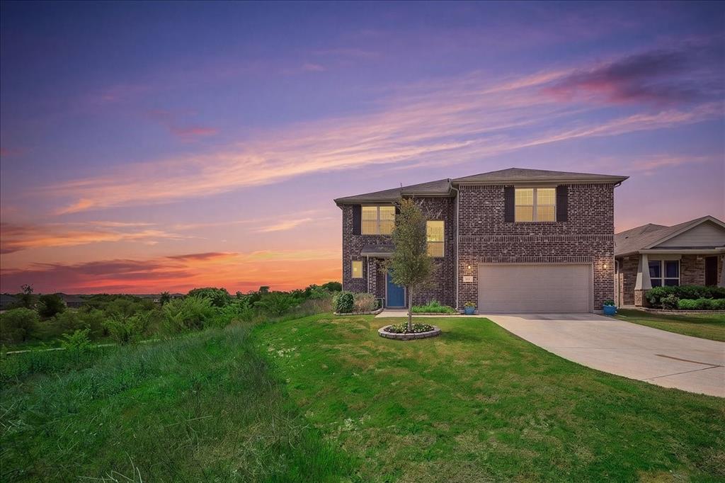 FIVE BEDROOMS, FOUR BATHS, 3,154 SQ FT, TWO ENSUITES, PAID 2-1 BUYDOWN INCLUDED! Exceptional space, storage and living flexibility on a premium elevated cul-de-sac bluff lot—all under $450,000. Beautifully maintained, this like-new home offers five spacious bedrooms, four baths with garden tub, two expansive living areas, office space, a workout or study alcove and abundant storage throughout.

The main-level primary suite provides privacy and convenience, while a rare second ensuite upstairs offers exceptional flexibility and privacy for guests or multigenerational living. Oversized additional bedrooms feature walk-in closets, and the upstairs spacious game-media room and cozy library alcove provide additional spaces to gather, work, exercise, or unwind.

Walls of beautiful windows fill the open-concept kitchen, dining and living areas with natural light while framing unobstructed trail, greenery and elevated 180-degree views. The kitchen features 42-inch cabinetry, quartz countertops, stainless steel Whirlpool appliances and a gas range. A tankless water heater adds everyday efficiency.

The generous backyard is ready for your vision, with room for an outdoor kitchen, fire pit, dining area, pool or spa, garden, play area or workout space. Enjoy direct access to more than three miles of walking and jogging trails, plus a dog park and playground.

Located two blocks from Uplift Elevate Preparatory and convenient to All Saints’ Episcopal School and Trinity Christian Academy. Quick access to I-30, Loop 820 and I-20 provides easy connections to airports, shopping, dining, the Cultural District, Stockyards and downtown Fort Worth. A rare combination of five-bedroom space, storage, versatility, value and setting—schedule your private showing today!