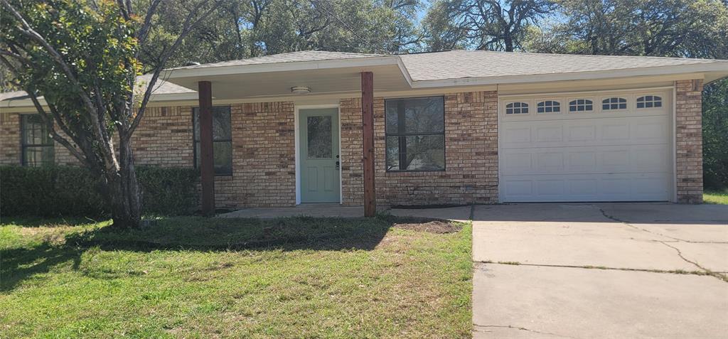 Newly remodeled and beautiful! Open concept, new hard flooring, new paint, super clean! Fridge is included. Ceiling fans in all rooms and vaulted ceilings in the master bedroom and living room. Large, fenced backyard (new wood fence) with large storage shed and lots of shade. Corner lot. Quiet, pleasant neighborhood with community pool. Great location on Ft Worth side of Granbury. HVAC 2023. New attic insulation 2023. Foundation repaired 2022 with lifetime warranty. Half bath is large enough to add a shower if desired. HOA is only $25 per YEAR. Property includes two lots. Lot 615 Longhorn Trail is used as the backyard.