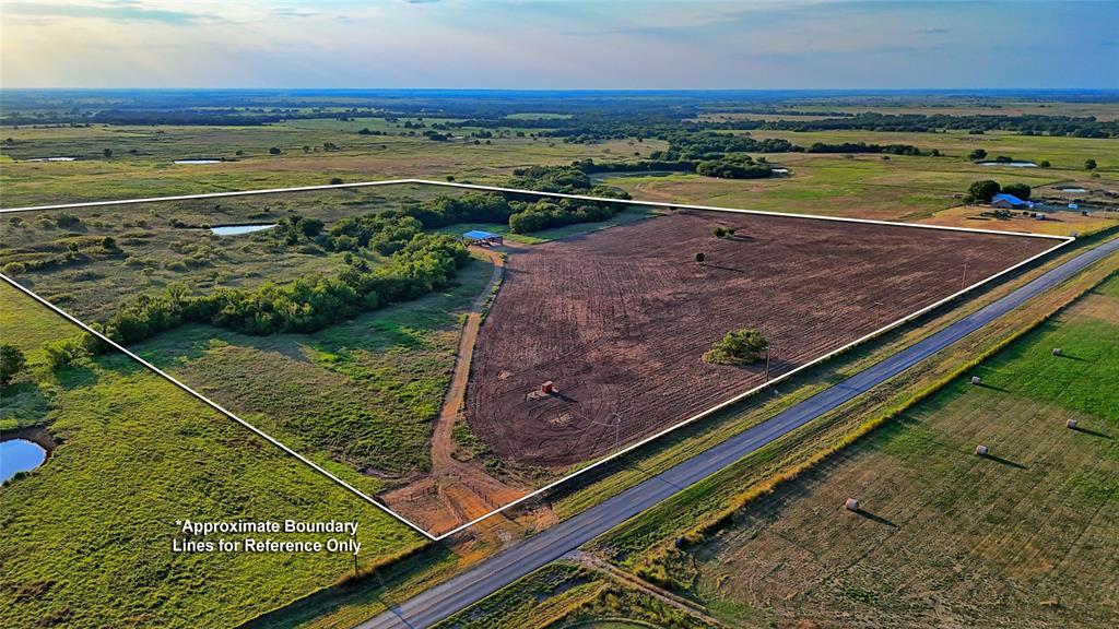 41 acres of country acreage just 1 mile north of Beautiful Nocona Texas! This property has approximately 1200 feet of frontage along Farm to Market 103 and is just a short drive to Lake Nocona. Located on this property is a 45x50 shed with 15 foot sidewalls, concrete floor, and RV hookup. Next to the shed is a septic system and propane tank for the RV hookup.  There is a wet weather creek that traverses this property from south to north and is lined with large mature trees including elms and post oaks plus there are multiple build sites for your forever home! Close enough to town for convenience but has that country feel.