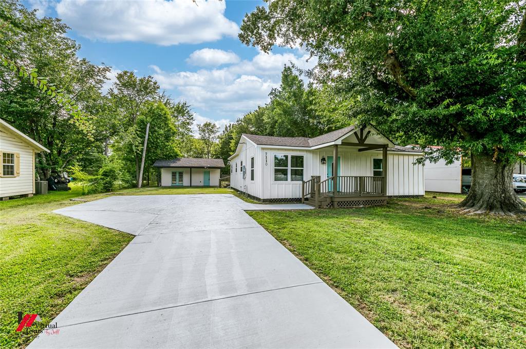 This beautifully renovated modern farmhouse in Greenwood is full of personality, comfort, and high-end touches throughout. Thoughtfully redesigned, this home features all-new plumbing, electrical, HVAC system, and water heater, giving buyers the peace of mind that the big-ticket updates are already done.

From the moment you walk in, you’ll notice the quality and attention to detail. The living room features a custom accent wall with rustic wood tones, luxury vinyl plank flooring, recessed lighting, and a layout that flows seamlessly into the dining and kitchen areas. The kitchen is a true showpiece — complete with butcher block countertops, stainless steel appliances, shaker-style cabinets, a bold black hex tile backsplash, matte black finishes, and a spacious walk-in pantry for extra storage and functionality.

The private primary suite offers dual closets, a bold modern accent wall, and a spa-style ensuite with a double vanity and oversized walk-in tiled shower. The second full bathroom features stylish tilework, updated fixtures, and a clean, modern feel. A large laundry room with custom shelving and cabinetry adds both convenience and charm.

Outdoors, the property offers a spacious lot with a concrete driveway and additional parking space. Whether you’re looking for modern design, upgraded systems, or a move-in ready home with character, this one checks all the boxes. Located just minutes from Shreveport, this Greenwood gem is ready for its next chapter.