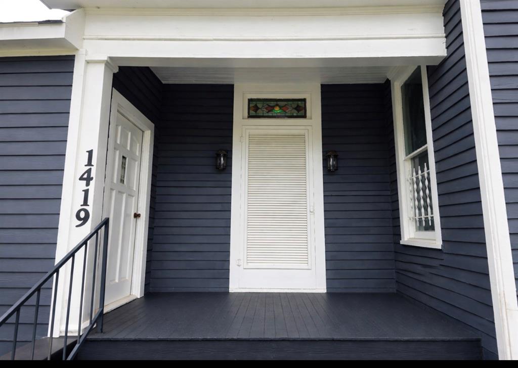 Welcome to 1419 N Sycamore St in Palestine, TX a place with room to spread out and make your own. This 3 bedroom, 3 bath home offers a flexible layout with multiple living areas, providing space for gathering, relaxing, or creating dedicated work or hobby areas. The primary suite includes an en suite bath and walk-in closet, while a secondary bedroom features an attached sitting room that may serve as a private retreat, office, or lounge. Interior features include built-in cabinetry and storage, accent lighting, ceiling heights reported to be approximately 12 feet, and a fireplace with blower. A bonus room offer additional space for a variety of uses. Enjoy outdoor living with front and rear porches and patio areas, along with a 2 car carport with gated access.