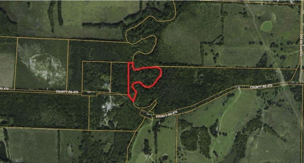 Great opportunity to escape to your own private retreat with this 2 acre wooded lot tucked away in the quiet countryside. Surrounded by mature trees and abundant wildlife, this property offers the perfect blend of seclusion and natural beauty. Whether you’re dreaming of building your forever home, creating a weekend getaway, or investing in land for the future, this serene setting provides endless possibilities. The whole property is in 100-year Floodplain. It's outside city limits