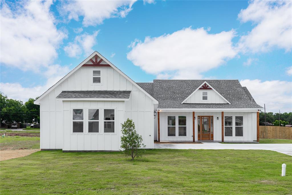 Stunning New Home in Early’s Premier Master-Planned Neighborhood – Early Bloom!!! Experience modern living in this beautifully designed 2,098 sq. ft. home featuring 4 bedrooms, 2.5 bathrooms, and a 2-car garage. Situated on a large lot in the heart of Early, this home sits directly across from McDonald Park with convenient access to local amenities, schools, and recreation. This residence offers a contemporary open-concept layout ideal for everyday living and gatherings. The split-bedroom design provides added privacy for the primary suite, while the half bath adds convenience for guests. The kitchen features quartz countertops, sleek cabinetry, and a functional layout perfect for cooking and entertaining. Enjoy outdoor living with a covered back patio overlooking the spacious yard. The primary suite includes a walk-in shower, soaking tub, and a large walk-in closet with direct access to the laundry room. Three additional bedrooms offer upgraded lighting, ceiling fans, and access to a full bath. Both full baths feature tile showers, and durable vinyl plank flooring runs throughout the home. The two-car garage provides ample storage. Professional landscaping with new sod in the front yard and a privacy fence enhance outdoor enjoyment. This home blends modern design and functional living in one of Early’s most desirable communities. Buyers may have the opportunity for limited customization of select finishes or features, subject to builder approval, construction stage, and additional cost.
