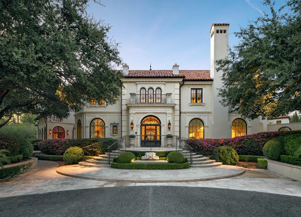 4000 Euclid Avenue is an icon — a remarkable fusion of Italian and French style — in Dallas’ most desirable neighborhood. In the heart of Highland Park, the centerpiece of this luxurious estate is a masterpiece of home design by renowned architect Robbie Fusch of Fusch Architects, meticulously crafted over five years and completed in 2015, by luxury home builder Waterside Properties.  Set on one of the largest lots in Highland Park — more than an acre of lush, landscaped grounds highlighted by vibrant azaleas and majestic live oaks — this extraordinarily graceful home is surrounded by beauty at every turn.  The home’s interior features both matte and gleaming plaster walls, wood-paneled walls, floors of limestone (reclaimed from French chateaux and imported from Paris) and exquisite hardware sourced from Bronzes de France. Every room exudes European elegance; every facet reflects a remarkable commitment to luxury, comfort, craftsmanship and grand-scale entertaining. It is much more than a home: It is a private retreat for those who appreciate the finest things in life.

The main level offers a grand foyer with soaring vaulted ceilings and a magnificent ceiling dome adorned with 24-karat gold leaf. The dining room boasts a marble fireplace imported from Europe, cracked-burlap walls and elegant wall niches backed in antique mirror. An intimate apéritif room offers views of the serene landscaping beyond. The living room is fitted with hand-carved custom millwork, Marmorino plaster walls and a stunning imported fireplace. There is a sunroom (complete with heated floors) for relaxation and dining, which opens to a tranquil courtyard (also with heated floors) that features a fishpond fountain, swimming pool, full alfresco kitchen and loggia with antique fireplace.