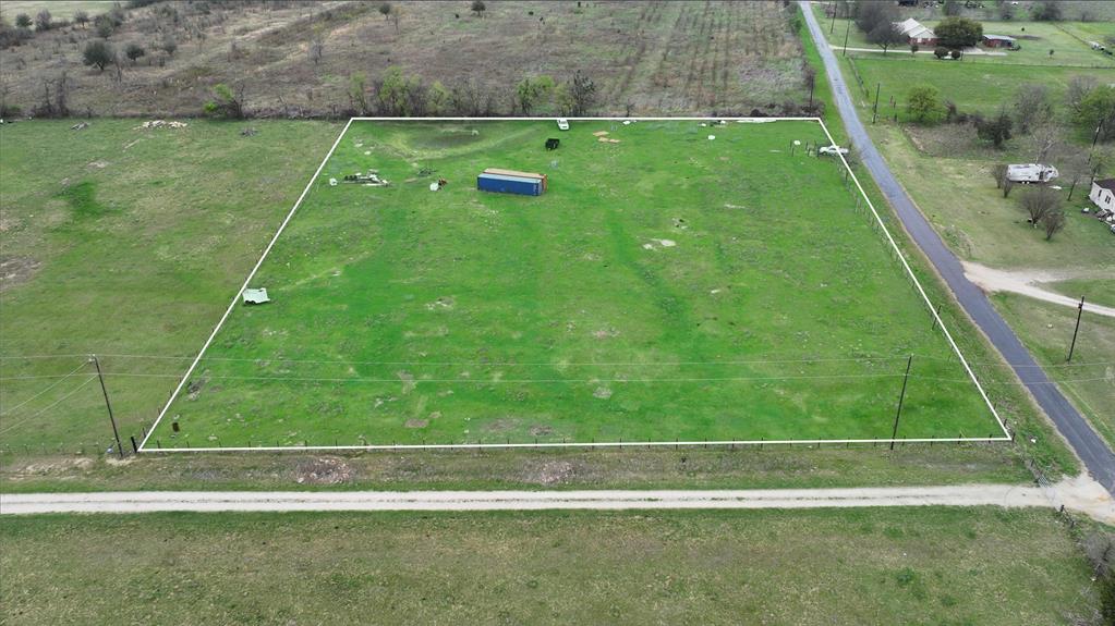 Rare opportunity to own acreage in a peaceful country setting just minutes from town with convenient access to shopping, restaurants, and more. New power lines, poles, and transformers installed along the private road frontage. Water tap-in is available through White Rock Water Supply. Flexible property use allows for manufactured homes, tiny homes, cabins, garden homes, and RVs. Whether you are looking to build a peaceful country home, create a weekend retreat, or invest in land for the future, these tracts offer flexibility and convenience in a quiet rural setting.