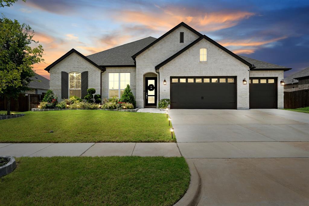 Welcome to 436 Brushwood Lane, a beautifully designed Highland Homes Canterbury floor plan located in the North Grove master-planned community of Waxahachie. This exceptional single-story home offers 4 bedrooms, 3.5 bathrooms, a private office, media room, multiple living areas, and a rare oversized 4-car tandem garage that is insulated and temperature-controlled for year-round functionality.

Designed with both comfort and versatility in mind, the open-concept floor plan features a spacious family room, luxury flooring, decorative lighting, abundant natural light, and thoughtfully selected finishes throughout. The chef-inspired kitchen showcases quartz countertops, stainless steel appliances, a gas cooktop, convection oven, extensive cabinetry, and a large island that serves as the heart of the home.

The private primary suite features bay windows and a spa-like ensuite bath with a freestanding soaking tub, oversized walk-in shower, dual vanities, and a spacious walk-in closet. Secondary bedrooms are well-positioned throughout the home, offering flexibility for a variety of living arrangements. A dedicated media room provides additional space for entertainment, while the private office offers an ideal work-from-home environment.

Step outside to the covered patio and enjoy outdoor living with space to relax, entertain, or unwind. Additional features include energy-efficient construction, generous storage, and premium upgrades throughout.

North Grove residents enjoy access to community amenities including parks, playgrounds, walking and biking trails, open green spaces, and gathering areas. Conveniently located near shopping, dining, and I-35E, this home combines modern design, functional living spaces, and a desirable location in one of Waxahachie's premier master-planned communities.

Schedule your private showing today and experience everything 436 Brushwood Lane has to offer.
