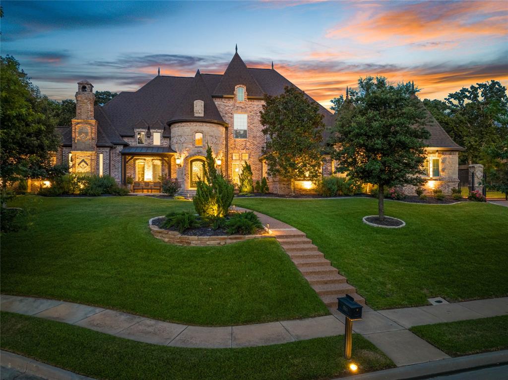 Situated on 0.84 acres in Keller's prestigious community, The Manors of Waterford, this stunning home offers unparalleled luxury and privacy. Featuring 5 bedrooms, including a primary and guest suite on the first floor, 5 full baths, and 2 half baths. This residence is perfect for both comfortable living and entertaining. The home also includes formal living and dining rooms, a game room, media room, and study. Completely updated with no expense spared, the gourmet kitchen has custom cabinetry, premium Wolf and Sub-Zero appliances, a Miele Coffee System, and elegant Quartzite countertops. The primary bathroom is a sanctuary with marble counters and floors, plus a workout room.  Designer light fixtures throughout. The outdoor oasis is breathtaking, featuring cool decking, fire pit, and a sparkling pool and hot tub remodeled by Claffey. The expansive entertaining area and large yard provide ample space for relaxation and recreation. Located in the highly sought-after Keller ISD.