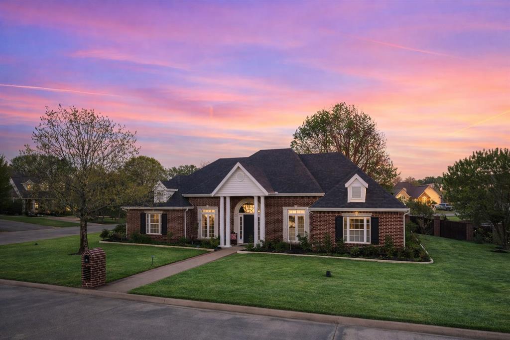 Situated within the prestigious Greenhill Park community, adjacent to the Mount Pleasant Country Club, this beautifully reimagined corner-lot residence offers the perfect blend of timeless elegance and modern comfort. Boasting 4 bedrooms, 3 full baths, and approximately 3,000 square feet of thoughtfully designed living space, this home is ideal for both refined entertaining and everyday living. Step inside to an inviting open-concept layout highlighted by vaulted ceilings, expansive living and dining areas, and a warm, welcoming fireplace. The fully updated interior features all-new flooring, fresh paint throughout, designer lighting, and upgraded fixtures—creating a cohesive and elevated aesthetic from room to room. The chef’s kitchen is a true centerpiece, complete with granite countertops, double ovens, gas cooktop, large island, and abundant cabinetry—perfect for hosting or everyday convenience. The primary suite offers a serene retreat with a spa-like bath, dual vanities, garden tub, separate shower, and a spacious walk-in closet. Outdoors, enjoy a resort-style setting designed for entertaining and relaxation. The custom-built pergola, outdoor grill area, built in heaters, turf, and ambient lighting create an exceptional backyard experience with low maintenance, while the lush Crown Zoysia lawn and irrigation system enhance curb appeal in the front. Additional highlights include a 2-car side-entry garage, smart home features, security system, and a prime corner lot location within one of Mount Pleasant’s most sought-after neighborhoods. This is a rare opportunity to own a move-in-ready home with luxury upgrades in the heart of Mount Pleasant.