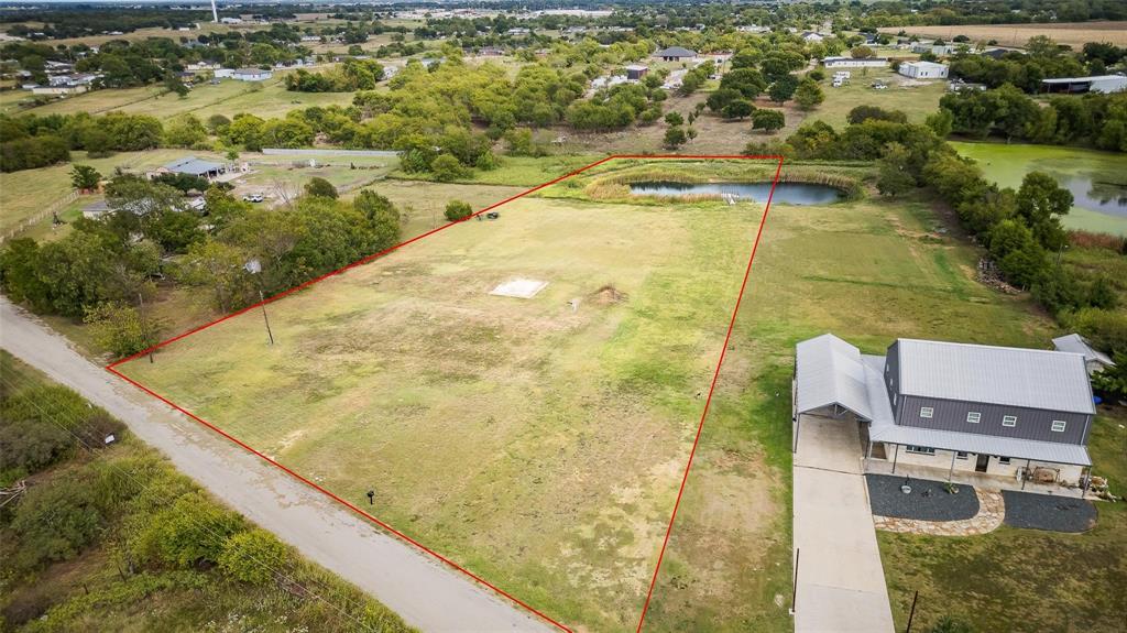 Escape the hustle of the city and embrace peaceful country living on this beautiful, build-ready property just outside the city limits in highly desired Palmer ISD. Sitting on nearly 3 acres, this serene homesite features a gorgeous private pond—an ideal backdrop for your custom dream home.
Nestled in a quiet, natural setting, the land offers the perfect balance of privacy, scenic beauty, and convenience. Picture waking up to sparkling water views, enjoying quiet mornings by the pond, and hosting gatherings under wide-open skies. Whether you envision a modern farmhouse, a luxury estate, or a cozy countryside retreat, this property provides the space and tranquility to make it a reality.

Located just off I-45, it offers an easy commute to Dallas and quick access to Ennis and Waxahachie, where charming downtowns, dining, shopping, and entertainment await. A brand-new, never-used aerobic septic system has already been installed, saving you time and expense as you begin building.

This is more than a piece of land—it’s an opportunity to craft the lifestyle you’ve been dreaming of. Don’t miss your chance to own this slice of paradise. Schedule your private tour today! Owner is related to a Texas Licensed Realtor.