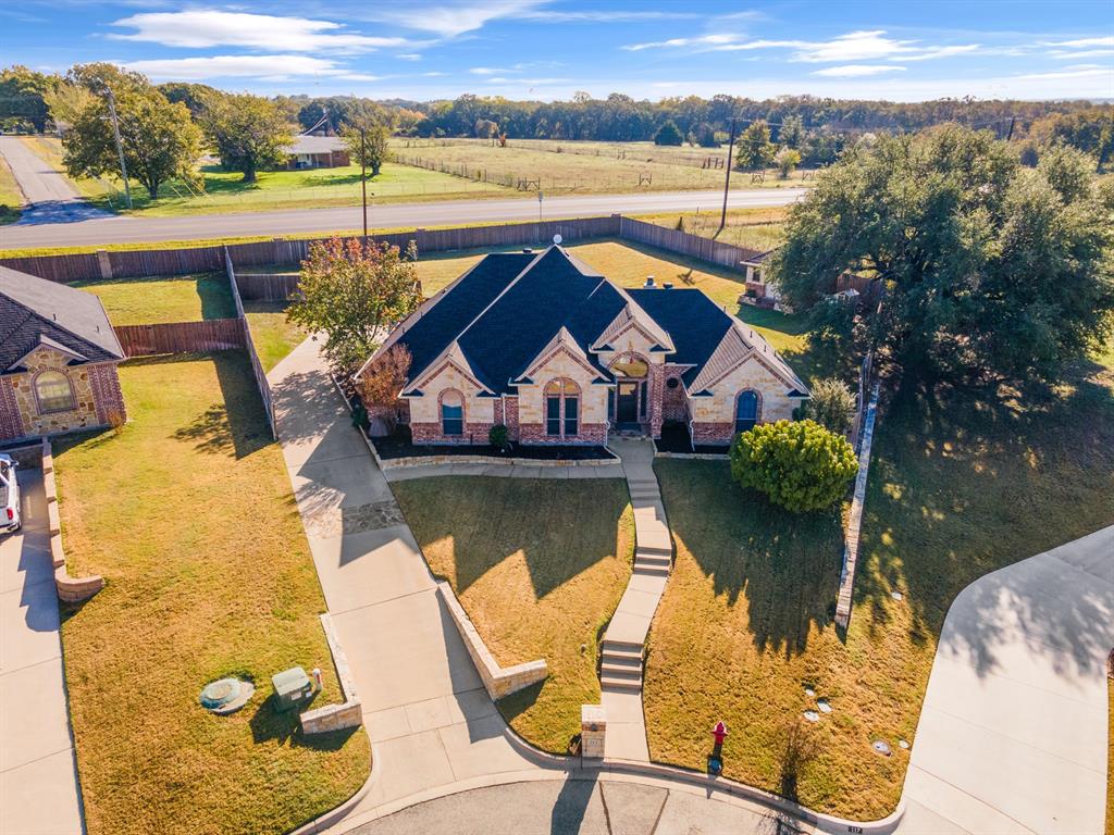 TEXAS Living ! HOUSE THAT HAS IT ALL ! Located in the highly sought after Mason Pond area, this home shows like a model home 4 bed 3 FULL bath and a back yard oasis. RV and boat parking, views for miles! Heated saltwater pool and SPA. 4th bedroom is perfect mother in law suite or 2nd master. 20ft + ceilings, floor to ceiling windows with tons of natural light ! Big primary bedroom, primary bath has dual vanities with separate jetted tub and shower, huge walk in closet. Almost half acre backyard that includes: Covered patio, lots of seating, matching brick shop or shed. The HOA includes a fully stocked fishing pond within walking distance ! New in 2019: NEW Roof, new appliances and new fence. NEW in 2021: Culligan soft water, reverse osmosis system, water heater, pool pump and pool sweep, high end security camera system and new paint throughout ! Don't sleep on the house ! - Listing agent is owner.