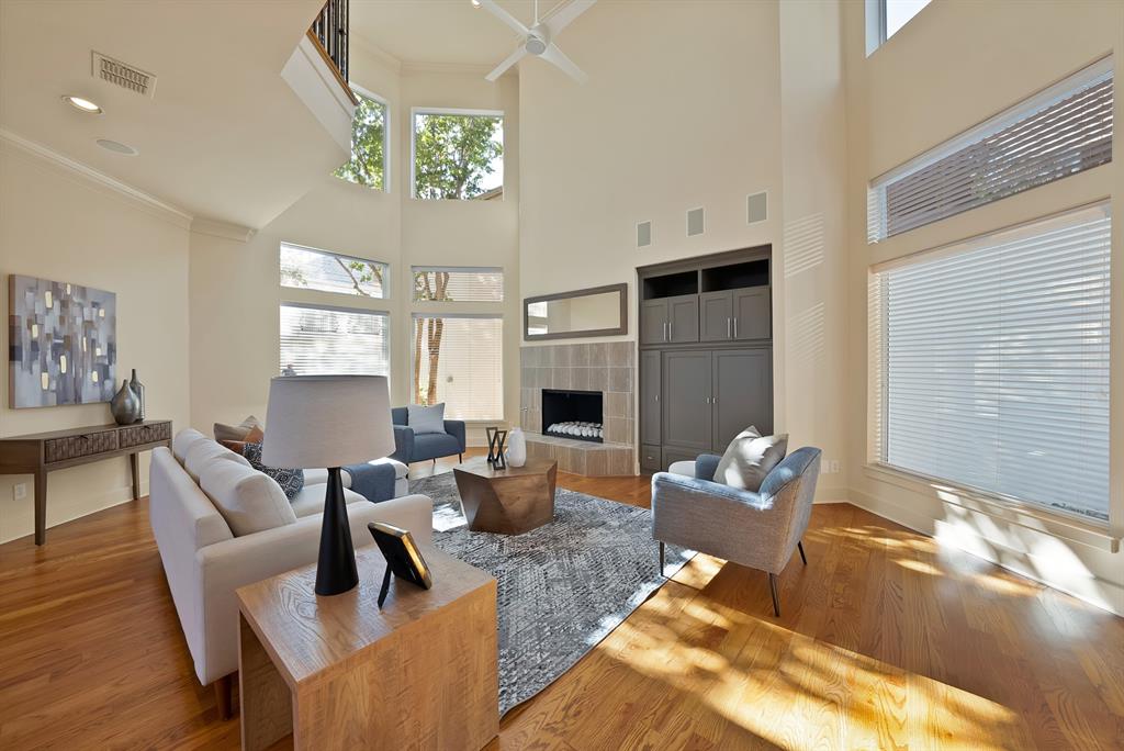 Step into a rare, serene haven tucked right in the heart of Dallas! Located in one of Oaklawn’s few exclusive gated neighborhoods, this beautifully maintained residence blends modern style with effortless everyday living. The spacious, open floor plan is an entertainer's dream, featuring warm wood floors that flow seamlessly through the bedrooms and closets.

At the center of the home is a fully remodeled, show-stopping kitchen. It boasts sleek countertops, a brand-new INDUCTION cooktop, hood, double ovens, and sink, plus clever details like pull-out recycling and trash bins. Flooded with natural light from newly replaced windows and premium Milgard sliding and French doors, the entire living space feels bright, airy, and refined. When it’s time to unwind, retreat to the primary suite’s renovated spa-like bath, complete with double shower heads, a new glass door, an upgraded vanity, and a modern heater and exhaust fan.

This home has been meticulously maintained with the heavy-hitting updates already handled for you! Enjoy two new water heaters with a hot water recirculation system, a chic modernized fireplace, updated lighting, a newer washer and dryer, and fresh 2024 exterior paint. Move in with total peace of mind thanks to a multi-camera security system, a recent 2025 HVAC tune-up, and professional vent cleaning.

Complete with a private patio and an extended driveway offering three dedicated parking spaces, this property perfectly balances privacy, style, and convenience. Located just minutes from Dallas’ most vibrant dining, nightlife, and shopping scenes, it provides the ultimate retreat from city life—without ever having to leave it!