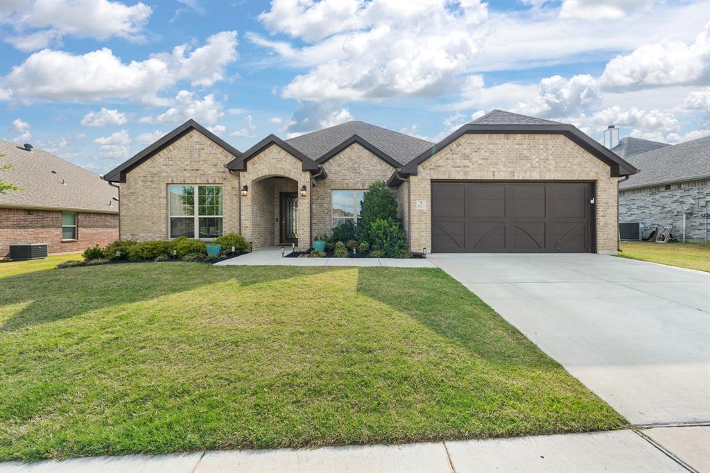 Welcome to 3117 Arbor View in Burleson, Texas—offering a well-designed open-concept floorplan with quality finishes throughout.
This home features a spacious living area with wood-look tile flooring, high ceilings, and abundant natural light, creating a comfortable space for everyday living and entertaining. The kitchen is open to the living and dining areas and includes a large island with seating, granite countertops, stainless steel appliances, and ample cabinetry .  There is also a formal dining area plus a second living area or office.  
The primary suite offers a private retreat with a generously sized bedroom and an ensuite bath complete with dual sinks, a soaking tub, separate walk-in shower, and a spacious walk-in closet.
Secondary bedrooms are well-sized and provide flexibility for guests, office space, or additional living needs.
Additional features include a dedicated laundry room with built-in cabinetry and sink, neutral color palette, and move-in ready condition.
The backyard includes a covered patio with an extended pergola, providing a functional outdoor living space ideal for relaxing or entertaining.
Conveniently located near local shopping, dining, and major roadways.  Call today to schedule an appointment to see this great home