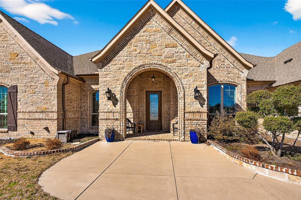 An Incredible Opportunity in Desirable Layden Farms! Don’t miss the chance to own this custom-built Nexus home on acreage in the sought-after Layden Farms community, offering quick access to the highway and the perfect blend of luxury and comfort. This stunning home features an open-concept layout designed for entertaining. The chef’s kitchen boasts beautiful knotty alder cabinetry, elegant countertops, a stylish backsplash, and a large 8-foot island overlooking the living area. You’ll love the high-end appliances and oversized walk-in pantry—a true heart of the home. The living room offers a cozy atmosphere with a gas fireplace and hardwood floors throughout the main living spaces. The spacious primary suite features a sitting area and serene views of the backyard pool. The luxurious en-suite bathroom includes a large walk-in shower, double vanities, and a high window that fills the space with natural light.  A flexible game room currently serves as a second primary suite, allowing you to adapt the home to your needs. At the front of the home, you’ll find two additional bedrooms connected by a Jack and Jill bath, while another bedroom and full bath sit on the opposite side of the home—ideal for guests or multigenerational living. The office with French doors can also function as a fifth bedroom. Every bedroom includes a walk-in closet for ample storage. Step outside to your private backyard oasis—complete with a sparkling pool featuring swim-up table seating, covered patio, pergola, and a fully equipped outdoor kitchen with a built-in bar, grill and sink, wired for sound and tv. It’s the perfect space for gatherings or relaxing evenings enjoying breathtaking sunsets.  This home is energy-efficient with foam insulation.