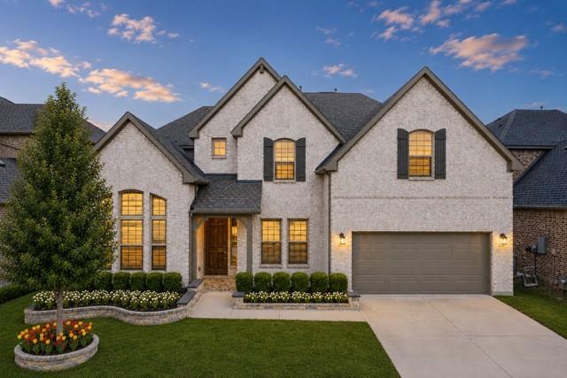 Exceptional two-story home in Auburn Hills offers sophisticated living in one of the area’s most desirable communities. From the moment you arrive, the striking curb appeal sets the tone with beautifully manicured landscaping, elegant stone-edged flower beds + a spacious front-facing 3-car garage. Step inside to soaring ceilings, abundant natural light & a grand open-concept layout. A private executive study is perfectly positioned off the entry, creating an ideal work-from-home retreat. Dramatic living room showcases vaulted ceilings, a stunning fireplace & an impressive wall of windows that frame picturesque backyard views. At the heart of the home, the designer kitchen is nothing short of spectacular with an oversized statement island, quartz, gas cooktop, SS apps, expansive prep space + an oversized WI pantry. The breakfast area is elevated by a striking chandelier. The 1st floor guest suite offers privacy & comfort for visitors, while additional conveniences include a stylish full bath, oversized utility room, and a mudroom complete with custom built-in storage for everyday organization. Luxurious primary retreat is generously proportioned & designed for relaxation, featuring a spa-inspired ensuite bath with dual vanities, quartz, a soaking garden tub, separate shower + an expansive walk-in closet. Upstairs is designed for elevated entertainment & flexible living, offering an oversized game room with endless possibilities for billiards, gaming, or lounge space, as well as a dedicated media room perfect for cinematic movie nights at home. Two spacious secondary bedrooms + two additional full baths complete the upper level. Outdoors, enjoy year-round entertaining beneath the covered patio with additional open-air patio space overlooking the expansive pool-sized backyard, a blank canvas for creating your dream outdoor oasis. Enjoy exceptional community amenities including resort-style pools, scenic walking trails, parks, playgrounds, and a tranquil fishing pond.