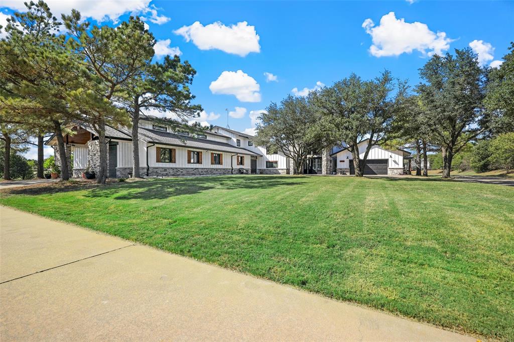 Newly renovated custom modern farmhouse property situated on just under 5 acres. The completely fenced property includes a pond, separate turn-out pasture, stables, workshop, and equipment barn. Multiple living areas include a Guest Apartment and Grooms or Caretakers’ quarters. Primely positioned in the heart of horse country, minutes from Ray Roberts Lake State Park and less than an hour from the Dallas, Fort Worth area. The perfect setup for discerning homeowners and ranchers to enjoy the peaceful country living of Pilot Point.
