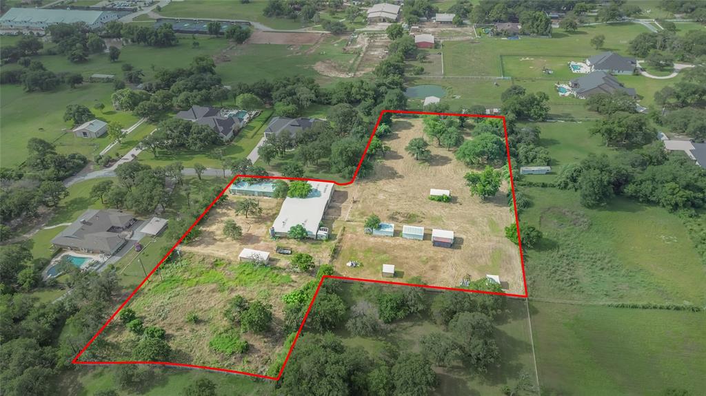 Rare opportunity to own approximately 3.6 acres of beautiful, usable land in the heart of Keller. Surrounded by established acreage properties and mature trees, this picturesque homesite offers the perfect blend of privacy, open space, and convenience. Whether you're dreaming of building a custom estate, creating an equestrian retreat, or simply enjoying room to spread out, the possibilities are endless! Previously improved for horse use, the property features multiple fenced pastures and paddocks, along with existing barns and a separate feed barn, providing excellent potential for equestrian enthusiasts or hobby farming. Utilities are already available on the property, making the transition to your dream home even easier. The gently rolling landscape is dotted with mature trees and expansive green space, offering a peaceful country atmosphere while remaining just minutes from shopping, dining, and major commuting routes. Enjoy the rare combination of acreage living and all the conveniences Keller has to offer. Property includes 3 parcels: #03755673, #04470648, 06531415
