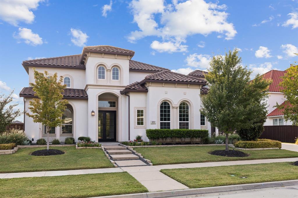 This Stunning East-facing Toll Brothers home offers a perfect blend of Mediterranean charm and modern luxury. The moment you step inside, you're greeted by a soaring double-height ceiling & a sweeping curved staircase w-wrought iron balusters—a dramatic & elegant first impression. Rich hardwoods flow throughout the entry &  into the main living spaces, enhancing the sense of warmth and sophistication. The Living rm is bright & airy w-soaring ceilings, sleek fireplace, built-ins & expansive windows that flood the room w-natural light. This kitchen is a showstopper w-white cabinetry, quartz island, built-in fridge, ice maker, double oven & pendant lighting. The luxurious primary suite offers a peaceful retreat w-sitting area and a spa-inspired ensuite bath complete w-a freestanding soaking tub, glass-enclosed shower, dual vanities & 2 closets. Upstairs offers a Game rm, Media, & 3 lrg beds w-ensuites. Step outside to your private backyard oasis, where a covered patio w-ceiling fan overlooks a sparkling pool & spa. Lush landscaping and a fenced yard provide beauty and privacy, while the outdoor living space is perfect for relaxing or hosting gatherings year-round. This home truly has it all—style, functionality, and an unbeatable outdoor lifestyle. 4 car garage! Neighborhood has clubhouse, state-of-the-art fitness facility, fishing pond, walking trails, 2 pools, splash pad, Bocce ball, Volleyball, Texas backyard BBQ area, playgrounds & more! Get to know your neighbors in this active community that hosts many monthly events including movies and concerts in the park, food trucks, sunrise yoga, holiday events, scavenger hunts, and more! This is more than a neighborhood, this is a LIFESTYLE! HOA dues include front yard maintenance and ADT security system! This prime location is minutes from DNT, Hwy 121, Hidden Cove Marina featuring bike trails, kayaking, BBQ, cabins, boating, basketball, volleyball. Close to restaurants, shopping, Grandscape, The Star & Shops at Legacy.