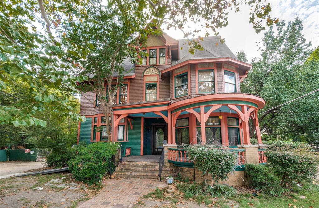 Rare opportunity to own a historic home in the heart of East Dallas. While the exact build year is unknown due to a fire at City Hall, records indicate this turn-of-the-century residence dates back to the late 1890s. A true period home, it offers timeless character and architectural significance rarely found today.
The property is accompanied by three surrounding parcels, creating a combined total of approximately 0.75 acres, including the home site. The additional lots are offered separately and include 4419 Junius Street, 4411 Junius Street, and 801 N. Carroll Avenue.
This unique assemblage presents endless potential for restoration, expansion, or investment.

Buyer will be responsible for obtaining a new survey. Property being SOLD AS IS