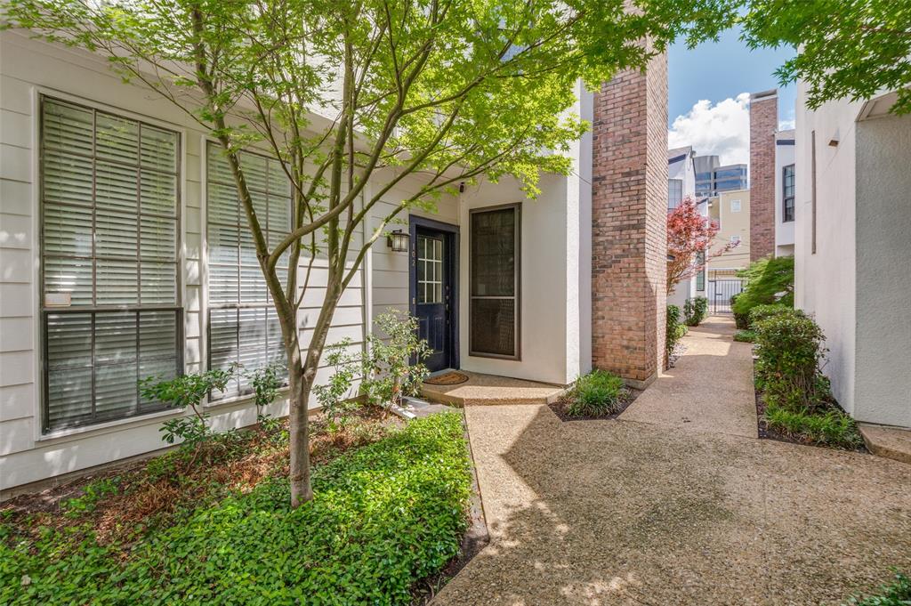 Pickleball or tennis at Cole Park anyone? Stroll the Katy Trail? Enjoy an evening out, dining and hanging out with friends? Welcome to this nicely updated condo located in Uptown and all the convenience and amenities that entails, West Village, Knox Henderson, Turtle Creek and Oaklawn, quick access to Interstate 75. As you enter you will notice an open floor plan, beautiful luxury vinyl plank flooring and windows that provide ample natural lighting. Living and dining areas flow seamlessly together and offer a warm and cozy feeling. Cooking is a breeze in the efficient and modern looking kitchen that boasts gleaming stone countertops and wood cabinets. Enjoy your favorite beverage while grilling or relaxing after a long day at work on the private patio, a rare treat for a condominium. Upstairs you will find the generous sized primary bedroom with double walk in closets and a soaring ceiling, as well as the secondary bedroom which can also be used for an office. The full bathroom comes with a double sink vanity and handsomely tiled tub shower combo, while downstairs offers an enlarged half bathroom for guests. This home has been carefully maintained and thoughtfully updated over the past years which include, vinyl windows, HVAC system, window and door security screens, water heater, kitchen appliances, faucets and an upgraded patio drainage system. Please note, this unit is one of the largest by square foot available in the complex. HOA offers lower affordable monthly fees and has replaced roof shingles in 2023 and painted the exterior this year.