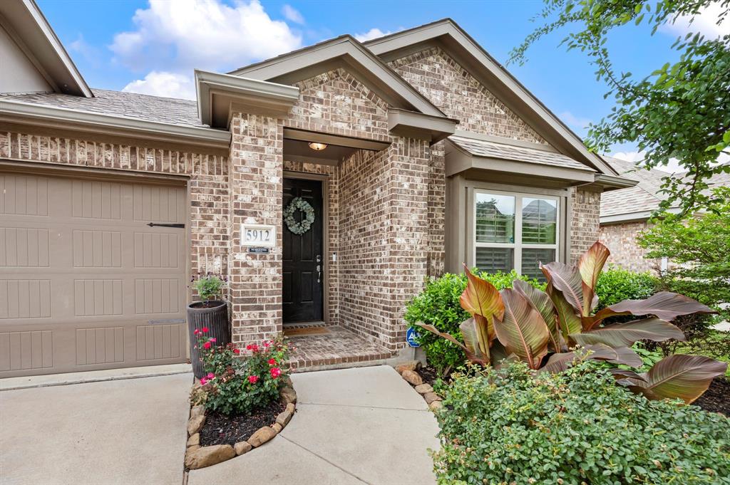 BRAND NEW ROOF, GUTTERS AND GARAGE DOOR! Move-in ready & full of stunning updates, this beautifully refreshed 3 bedroom, 2 bathroom home in highly sought-after Prosper ISD perfectly blends style, comfort & functionality with a warm & inviting feel from the moment you arrive. Gorgeous curb appeal and thoughtful designer touches throughout make this home truly stand out. Inside, you’ll love the bright open-concept floor plan designed for both effortless entertaining & everyday living. The beautifully updated kitchen is truly the heart of the home featuring gorgeous quartz countertops, updated stainless steel appliances, a recently updated stove & microwave, beautiful cabinetry & a refrigerator that stays making this home completely move-in ready. The spacious living room flows seamlessly from the kitchen creating the perfect gathering space for hosting family & friends or simply relaxing at home. At the front of the home, a versatile flex space offers endless possibilities as a home office, second living area, playroom, or workout room to fit your lifestyle needs. Every inch of this home has been thoughtfully updated including all flooring throughout with beautiful designer finishes and stylish tile accents in the bathrooms and laundry room adding  charm & sophistication. Updated lighting, ceiling fans, upgraded shutters and blinds, and fabulous custom built-in shelving in the hallway add the perfect finishing touches throughout the home. The private primary suite offers a peaceful retreat complete with a relaxing ensuite bath designed for comfort and tranquility. Step outside to your own backyard oasis featuring a covered patio and private setting perfect for enjoying beautiful Texas evenings year-round. Immaculately maintained and beautifully updated throughout, this exceptional home truly checks every box with the perfect combination of style, warmth, location, and thoughtful upgrades. Welcome Home!