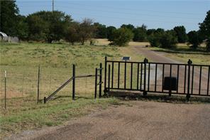This property is wooded, and has frontage on Sante Fe and along the exit ramp on the North East side of Sante Fe off of I 20. This is zoned central business in some areas, and commercial in other sections. It also backs up to a residential area. There is a gated entrance off of Sante Fe, with good roads to view the property.