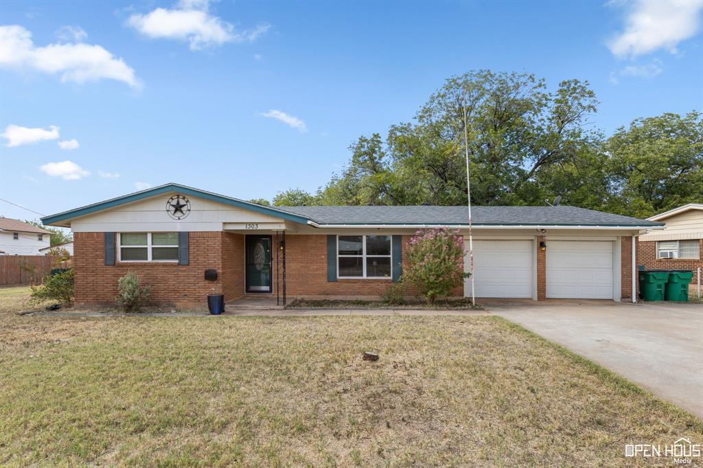 This 3-bedroom, 1.5-bath home is a classic choice for comfortable living.  Situated on a generous lot, this property boasts a spacious backyard, complete with a well-equipped shop featuring electricity.  The fenced yard ensures safety for kids and pets, making it ideal for a new family or as a starter home. Located in a friendly neighborhood, you'll enjoy the sense of community while being close to schools and essential amenities.