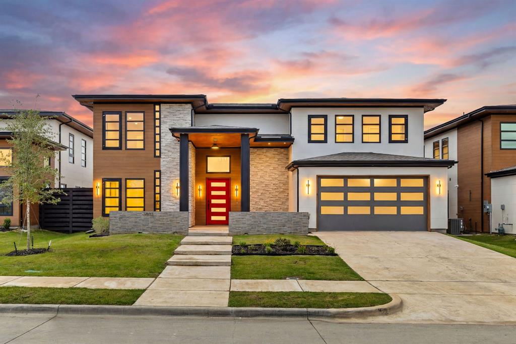 The Liane Residence at The Dawn introduces a rarer expression of modern living in North Texas — where architectural restraint, structural permanence, and elevated design exist in quiet harmony. Set within an intimate cul-de-sac enclave of just nine residences in Melissa, the home was conceived with a level of intention seldom found in contemporary construction. Warm natural textures, expansive walls of glass, and clean architectural lines create a presence that feels refined from the moment of arrival. Inside, soaring volumes and shifting natural light define the atmosphere throughout the home. The living spaces unfold with openness and ease, balanced by a warmth that feels inviting rather than formal. A sculptural kitchen anchors the residence naturally, connecting the interior to covered outdoor living designed for quiet evenings, conversation, and gathering. Privately positioned on the main level, the primary suite offers separation and stillness within the home itself. Above, a second layer of living emerges through elevated lounge spaces, media retreat, and private terrace overlooking the openness below. What ultimately distinguishes The Liane Residence is the integrity beneath the architecture. Constructed entirely with advanced cold-formed steel framing and engineered to achieve an exceptional HERS Index Score of 59, the residence was designed for a quieter, stronger, and more efficient way of living — offering a level of durability and long-term performance rarely found in traditional residential construction. For a limited time, up to $30,000 in builder incentives are available. A home defined not only by appearance, but by permanence. The Liane Residence at The Dawn. Modern luxury, built differently.