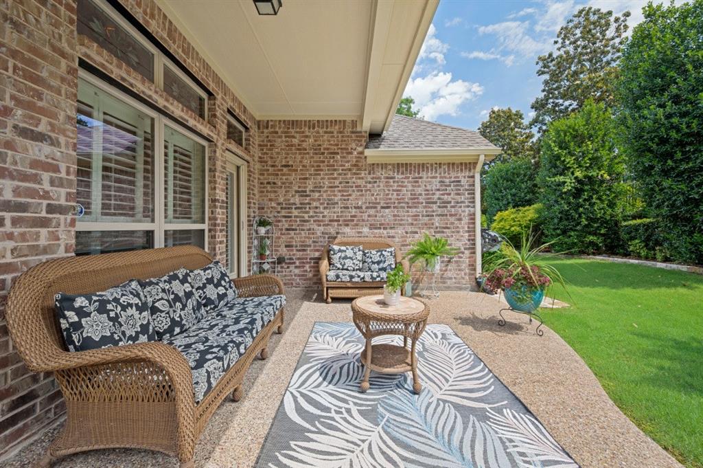 SENIOR RESORT LIVING AT IT'S BEST-  Top Golf Course in North Tx. HUGE FENCED YARD OFFERS PRIVACY ON BOTH SIDES. Charming 2BR K HOV in a Picturesque Cul De Sac at Heritage Ranch. MOVE in READY, Custom Built, open floor plan, great for entertaining. Features a Focal Floor to Ceiling STONE FIREPLACE, Added Quality Wood floors less than 2 yrs ago in LR , Study & both BR. Warm designer wall finishes, high end wood shutters throughout, updated lighting fixtures. Kitchen offers a gas stovetop updated dishwasher, granite counters, 2 microwaves, stainless sink & walk in pantry, stainless Refrigerator conveys. Private Study or Den has French doors, ideal for watching TV & has a nook for a computer desk. Large Primary BR has a wall of windows & space for sitting area. Both Bath vanities have been updated with granite, & have 18 inch neutral tile flooring. Larger Lot is the size of 1 & half regular lots which offers custom fencing ideal for pet. Large laundry room with built in cabinets and sink Extended patio & lush landscaping, mature trees & shrubs. Golf, Pickleball, Tennis, indoor & outdoor pools, 2 Restaurants, Club House venue for concerts & wide variety of activities.
