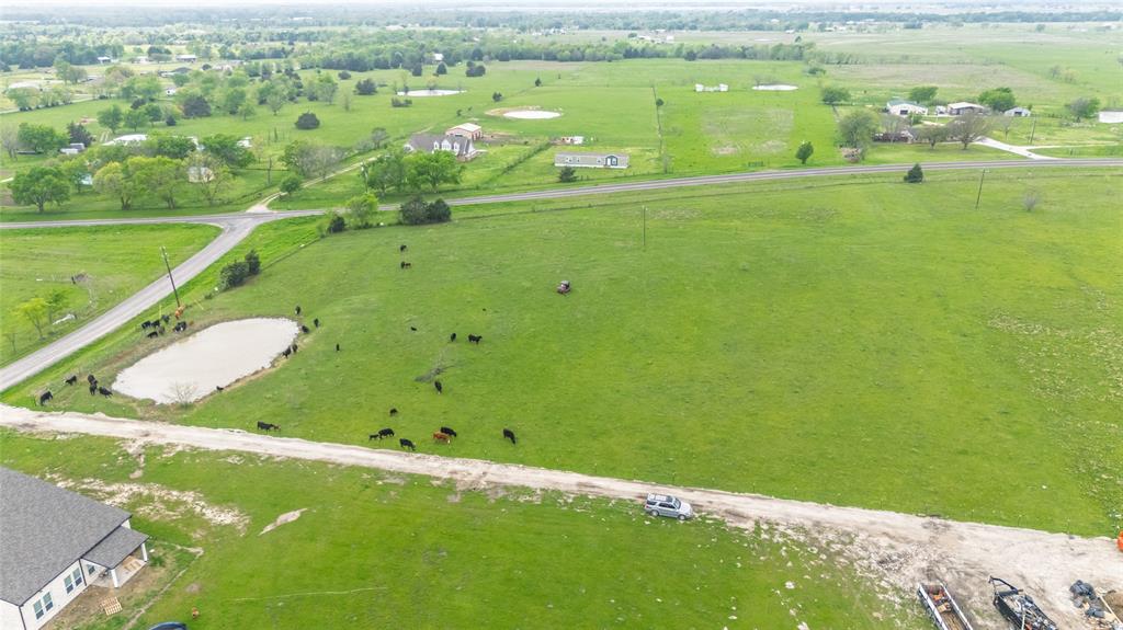 Price just reduced by $5,000. Plus, seller is offering an additional $5,000
 in concessions — use it for closing costs or to buy down your interest rate! Great opportunity to build your dream home, mobile home, or barndominium on this spacious lot in Quinlan, TX. With reasonable deed restrictions to maintain land value and no HOA, you have the flexibility to create your ideal property. The lot also qualifies for an agricultural exemption with a minimum of 4 acres. The adjacent lot is also available for sale (MLS #20879309) for even more possibilities. Recent road upgrades provide improved access, and utilities including electricity and water lines are already available. New homes have already been built in Rancho Estates, making this an ideal location for your future home. Enjoy peaceful country living with easy access to shopping, dining, schools, and other amenities in Quinlan and nearby areas. Perfect location for your future home or investment. This lot is located in the corner, giving you prime access. The electric poles are scheduled to be moved. Schedule your tour today while this gem is still available. Use GPS with this address 1592 Co Rd 3517, Quinlan, TX 75474.