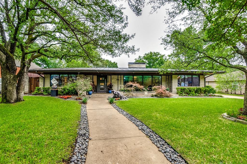 Absolutely gorgeous home with stunning modern and contemporary finishes. It's simply exquisite. The open layout features 3 bedrooms, all with ensuite bathrooms, two large living areas, an amazing kitchen, several walls of windows, a separate detached 238 sq ft study and a great backyard with a pool and tons of privacy. The kitchen features custom cabinets, quartz counters, a 9x3 center island with barstool seating, a Sub-Zero refrigerator and Wolf appliances that include a double oven, microwave and a 5 burner gas cooktop. The huge den has a wall of windows that overlooks the backyard and a decorative fireplace with a gas starter. The master bedroom retreat has a large bedroom with a wall of windows and a master bathroom with floating cabinets, a custom bathtub, a separate shower and a large walk-in closet with built-ins. The backyard paradise has a gleaming pool and provides several places to relax and entertain. Being in this home is like being on vacation. Make it yours!