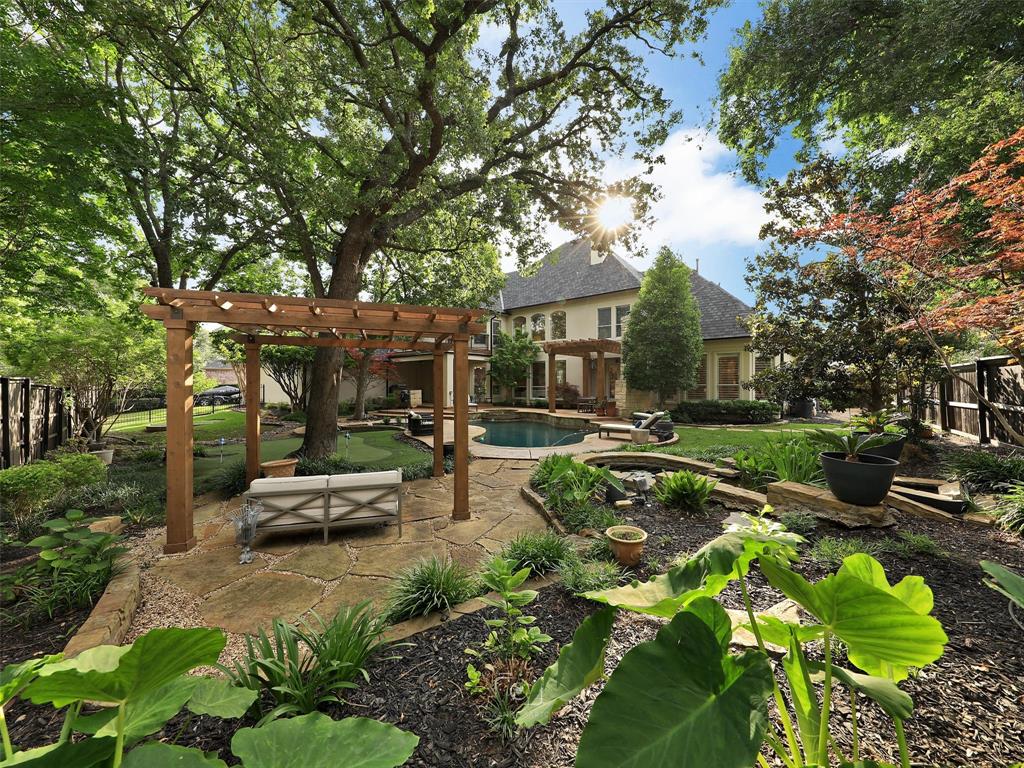 Welcome home to this stunning, completely updated, transitional home in prestigious Timarron Estates of Bent Creek. This spectacular home greets with double iron doors, soaring Entry with sweeping staircase, Executive Study & Formal Living & Dining rooms. Temperature controlled wine cellar & wet bar lead to the Great room with a modern aesthetic & gorgeous backyard views! The spacious Family room has a cast stone fireplace + built-in cabinetry. The Chef's Kitchen is a dream with professional appliances,  gas built-in range, impressive quartzite countertops-backsplash & tons of storage. Enter the luxurious Primary with perfect backyard views, spa bath w jetted soaking tub, dual vanities + large walk-in closet with custom closet. Guest Suite is down. Upstairs are 4 private Beds w updated ensuite baths & walk in closets + Game room with balcony. Step outside to the backyard oasis w sparkling pool & spa, covered living areas, outdoor kitchen, tons of grass, putting green + gorgeous trees.