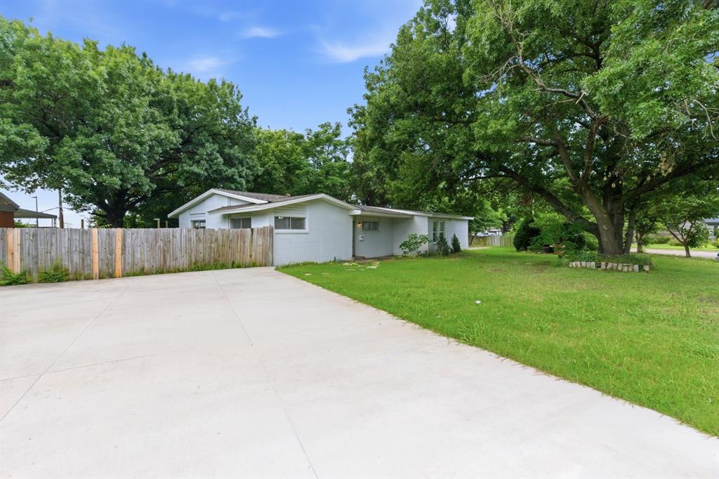 Updated 4-bedroom, 2-bath home offering modern finishes and everyday comfort. Features include quartz countertops, updated cabinetry, fresh paint, and updated flooring throughout. The spacious layout is perfect for both relaxing and entertaining.

Looking for ample parking space? Say no more! The extended driveway provides room for up to 8 vehicles, making it ideal for multiple drivers, guests, work vehicles, or recreational toys. Convenient corner lot near shopping, dining, major highways, and White Rock Lake, this move-in-ready home offers both comfort and convenience.