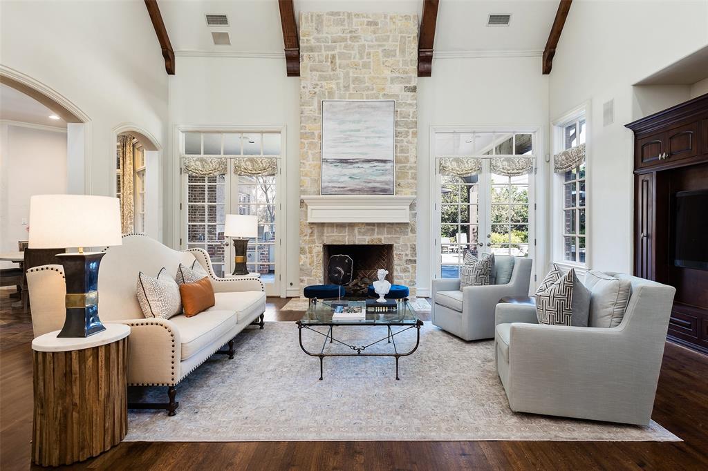 NEW LOOK, NEW PRICE IN THE HEART OF PRESTON HOLLOW. Come visit this well planned 6 brm, 4 car, custom build on .430 acre with June 2019 NEW ROOF. A blend of desired transitional styling mixed w a hint of European country, featuring an abundance of natural light and open concept living. Dedicated master wing and convenient in-law suite are down, 4 extra large private bed suites are up. 2 separate laundry rooms, enormous game room w mini kitchen and 3 large walk-in attics. A spectacular veranda w fireplace, full kitchen, grill, open patio spaces and pool, spa and water feature. Exceptional value in the sought after neighborhood in the middle of the block, close to all the private schools and shopping.