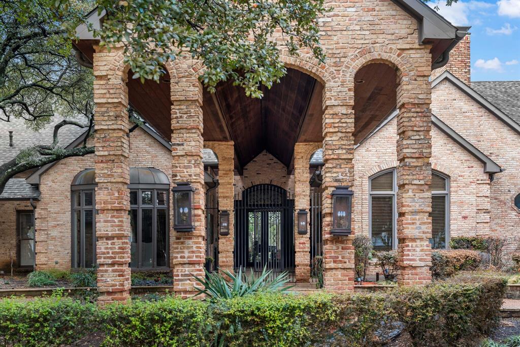 Welcome to luxury living in this rare single-story estate situated on a 1.5-acre corner lot in the heart of Willow Bend Country. An entertainer’s paradise, this home showcases a circular drive-up with a porte-cochere and a grand entryway that overlooks the sprawling backyard oasis. Make your way into the heart of the home and you’ll find a large gourmet kitchen with plenty of storage, a cocktail bar, a butler’s pantry, and an expansive living room perfect for hosting. As you retreat to the primary bedroom, cozy up next to the double-sided fireplace or enjoy spa-like amenities with full baths. Attached is a flex space with an additional private bathroom ideal for a nursery or fitness room. Large secondary bedrooms each with its private bathroom are on the opposite wing of the home. Outside hosts a sports court, outdoor kitchen, garden area, and a hard-to-find diving pool complete with a pool or guest house.