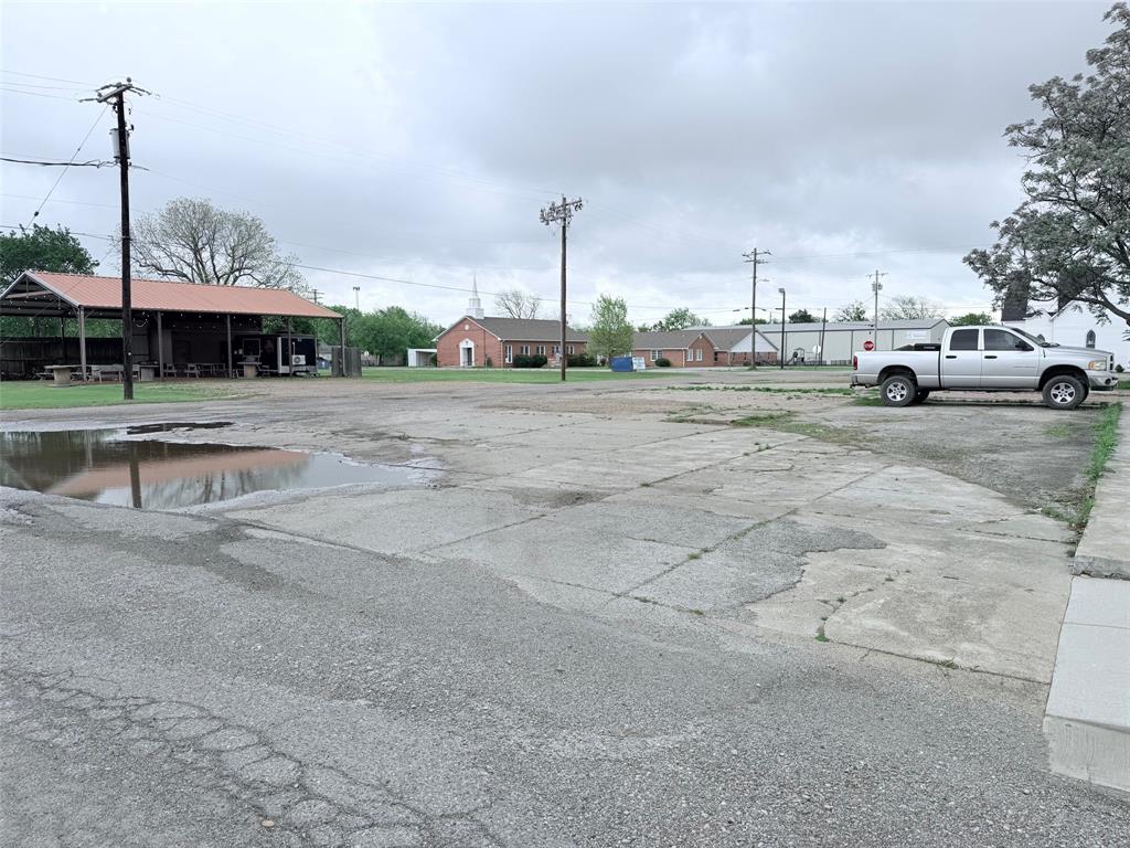 Prime investment opportunity in the heart of rapidly growing downtown Trenton. This corner lot is commercially zoned and offers endless potential for development. Currently utilized as a parking area, the property is ideally positioned for a variety of ventures, including a restaurant, retail space, or other commercial projects. With its highly visible location and flexible zoning, this lot is ready to bring your vision to life.
