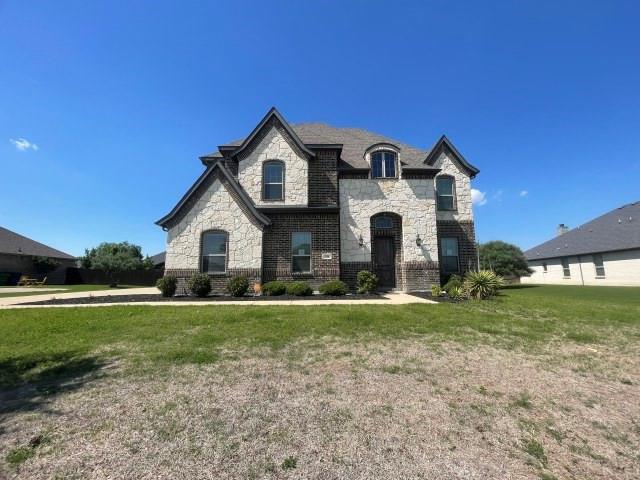 4 bedroom, 3.5 bath home with open floor plan, office, bonus room, covered patio, fenced backyard and side entry garage.