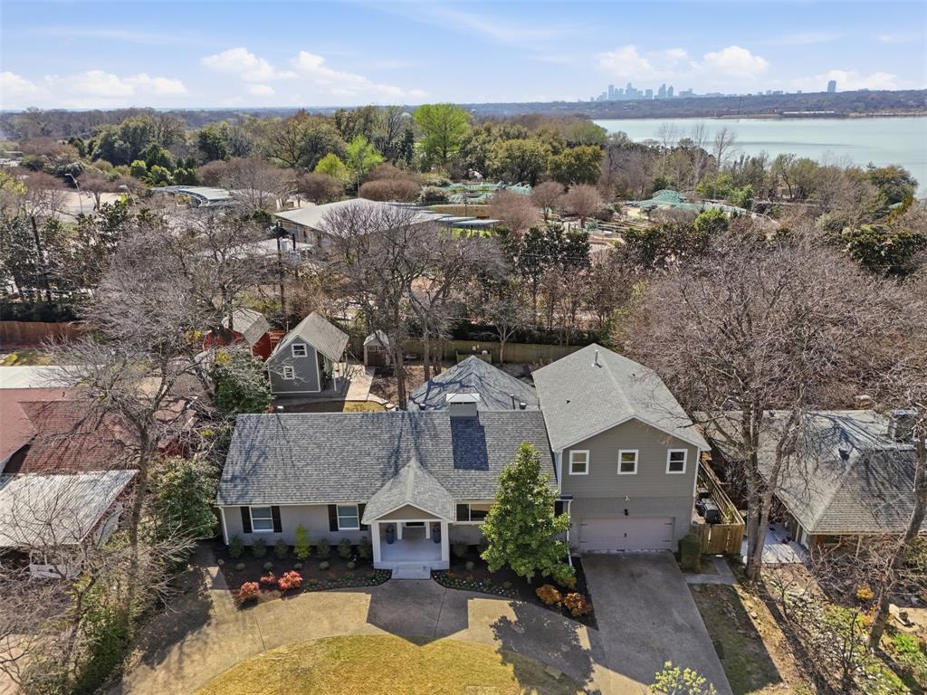 Price Improvement! Exceptional value near White Rock Lake, this refreshed residence in the established Emerald Isle neighborhood offers a rare opportunity in a high-growth area. The 3,238-square-foot home sits on a lush, spacious 0.3-acre lot and features a recent roof, fresh updates, and a recent price improvement. The functional floor plan includes 4 bedrooms and 3 bathrooms, complemented by a private pool and a BONUS detached guest quarters perfect for a home office or she-shed. With local builder activity and tear-downs on the rise, this property is a rare find for buyers looking to secure a large lot and versatile living space before new construction further drives neighborhood pricing.