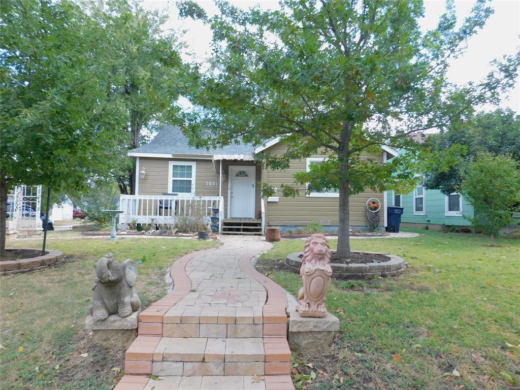 Corner lot property with main house and either a guest home or rental attached. The main home has 3 bedrooms and 1.5 baths, covered patio and storage areas, with a Large bonus room upstairs. The guest house has separate entry with 2 bedrooms, 1 bath, kitchen and living room. Corner lot, so ample parking. Main home has central HVAC. Guest unit has window units.