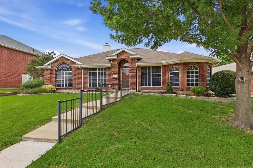 Charming single-story home featuring 3 bedrooms and 2 baths with a flexible floorplan and inviting living spaces. The front living and dining area offers great versatility, while the open family room, kitchen, and breakfast area create the perfect space for everyday living and entertaining. Family room features a cozy fireplace and overlooks the spacious enclosed back porch, providing additional space to relax year-round. Split bedroom layout includes two secondary bedrooms and bath toward the front of the home, with the private primary suite tucked away off the family room. Large laundry area and rear-entry garage add convenience. Cute backyard with easy access to shopping, restaurants, and major commuting routes. Pictures with furniture are virtually staged.