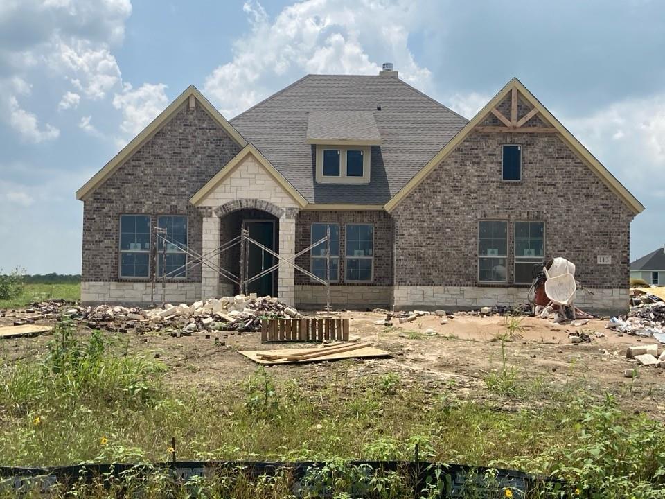 Estimated September 2026 completion! Ask us about our Trade In Trade Up program, we can buy your home! The Verbena floor plan features a modern, open-concept layout and the sought-after features today’s homeowners are searching for. With four bedrooms, three bathrooms, and a flex room, this plan boasts just over 2,400 square feet of functional living space. Upon entering the home off the front porch, you’re welcomed by an inviting foyer. Immediately to the left is a hallway with a bedroom, walk-in closet and full bathroom, as well as a linen closet. Across the foyer is a flex room, perfect for a home office, formal dining room or whatever need your family has for the space. Past the foyer is the family entry, with storage space and mud bench, which leads to the laundry room and two or three car attached garage. Through the entrance, the home opens up to a large family room with a stately fireplace. Adjacent to the family room is a gourmet kitchen, equipped with a walk-in pantry, ample counter space and an oversized island. Finishing off this open-concept living area is a dining space which overlooks the covered back patio. The remainder of this one-story floor plan is just off the living space. A hall leads to two bedrooms with walk-in closets, another linen closet and a shared full bathroom. The back corner of the home offers privacy for the owner’s suite, featuring a massive walk-in closet and bathroom with a dual-sink vanity, standalone soaking tub and glass-enclosed shower.
