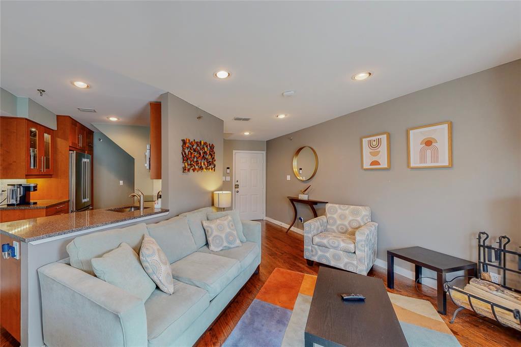 Come see this fully renovated and fully furnished condo located in the heart of Dallas, offering an easy, turn-key lifestyle just minutes from Downtown, Uptown, Deep Ellum, the Arts District, Baylor Hospital, parks, restaurants, shops, and museums. The open-concept first floor seamlessly connects the living, dining, and kitchen areas, featuring quartz countertops, custom cabinetry, and stainless steel appliances—including a full-sized French door refrigerator. Site-stained hardwood flooring flows throughout the home, complemented by energy-efficient windows and doors, designer colors, and beautiful soft contemporary furnishings. The spacious primary suite easily fits a king bed and boasts an expansive walk-in closet with custom built-ins. The renovated bathroom impresses with a mosaic tile shower, rain head, and separate hand-held fixtures. Additional highlights include great storage and a full-sized front loader stacked washer and dryer. Residents also have the option to join the nearby Bryan Place Pool & Club House—perfect for enjoying the vibrant Dallas lifestyle.