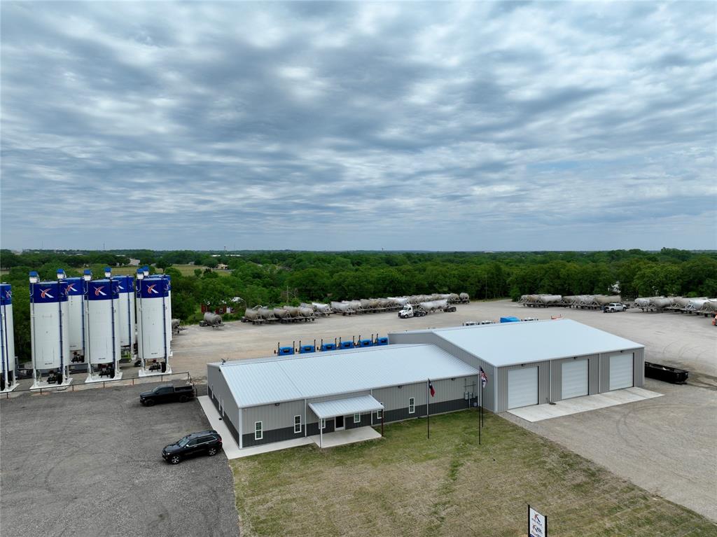 Fantastic investment opportunity to own a new class A office-warehouse located on 5.4 acres in Weatherford, Texas. Office size is 5,905 sqft and warehouse is 7,182 sqft with 16' ceilings and five 14x14 roll up doors. A 5 year lease was signed last November 2022 along with two additional options with inflation bumps added. This is a great way to diversify your investment portfolio. Owner is in the process of adding additional sqft to the building. Construction should be completed within 3 months.