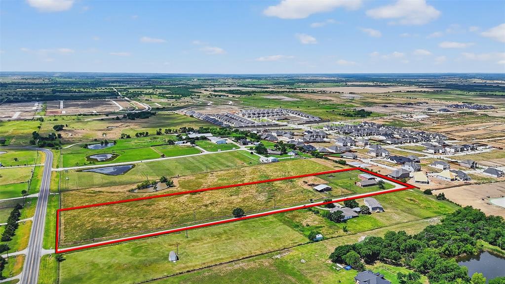 This prime property has approx 246 feet of frontage along Future Legacy Rd. (FM 455) and is ideally located just east of the Dallas Parkway, offering excellent visibility and access. Situated in one of the fastest-growing corridors in North Texas, this tract is well-suited for retail or commercial development. With extensive development already underway in the surrounding area, the possibilities are endless. Whether you're looking to develop immediately or hold for future appreciation, this property offers both strategic location and long-term value.
Don’t miss this exceptional opportunity to invest in a high-growth area!   Home can be seen after looking and expressing interest in the land.  There is an additional 6 ac to the south also available.   That would be a nice addition to have a 12 ac block.