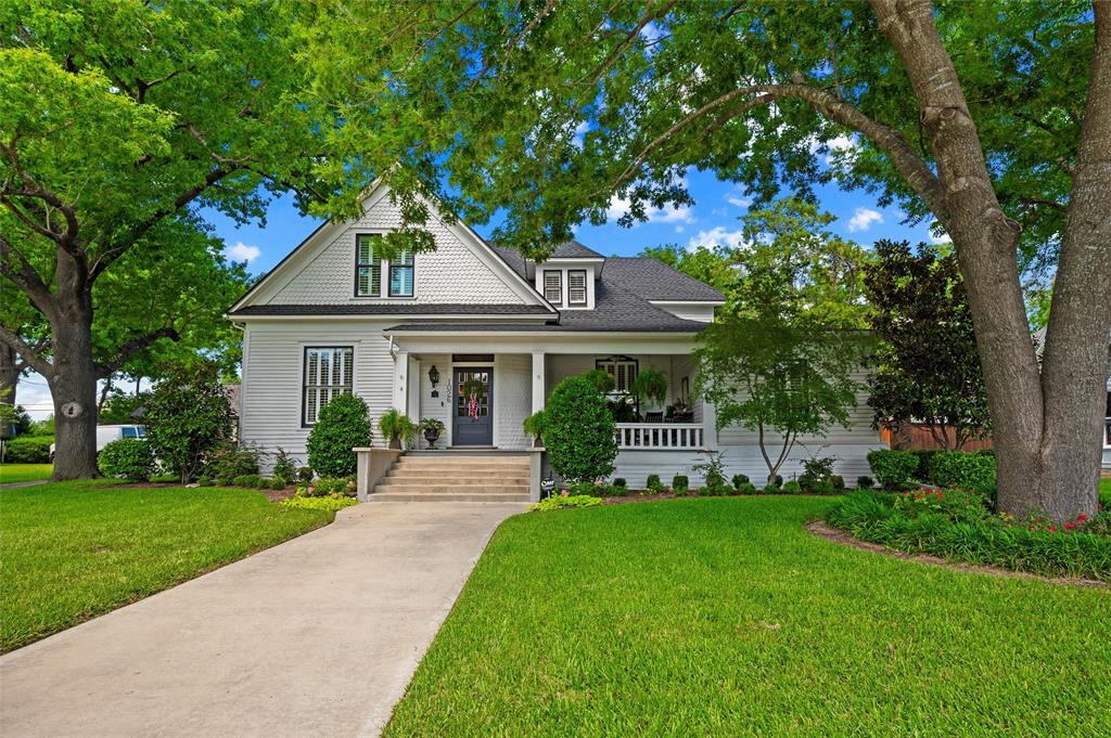 A rare Waxahachie treasure, 1026 W Main Street is the kind of historic home that feels as if it has been loved, protected, and thoughtfully brought into its next chapter. Originally built in 1902 as a classic Victorian residence, this home carries more than a century of character while offering the comfort and function today’s buyers want. A 2015 studs-out renovation modernized the essentials, including electrical, plumbing, HVAC, insulation, tankless water heater, appliances, and more, while preserving the details that give the home its soul. The original hand-beveled glass front door, quarter-sawn wood floors, trim, pocket doors, interior doors, beadboard, antique fixtures, and repurposed materials tell a story in nearly every room. The kitchen is unforgettable, with a custom island crafted from an iron balcony salvaged from a historic Dallas hotel, original beadboard, vintage Brussels streetlamps, marble counters, abundant cabinetry, and a 48-inch Wolf cooktop with French griddle. Warm gathering spaces are filled with natural light, rich wood ceilings, millwork, fireplaces, and layered architectural details that feel grand yet personal. The primary suite includes a meaningful piece of the home’s history with a clawfoot tub originally installed upstairs in 1909 and relocated during the renovation. Outside, the front porch, mature trees, rebuilt retaining wall, and inviting curb appeal set a timeless first impression, while the backyard feels like a private retreat with a pool added in 2023, covered porch, outdoor living, and brickwork made from original bricks found on the property. The detached garage adds opportunity with a 2025 roof, new slab, roughed-in electrical and plumbing, and three new garage doors, creating potential for a workshop, studio, guest quarters, or storage. Set in the heart of historic Waxahachie, this extraordinary home blends authenticity, craftsmanship, thoughtful restoration, and everyday livability in a way that is truly hard to find.
