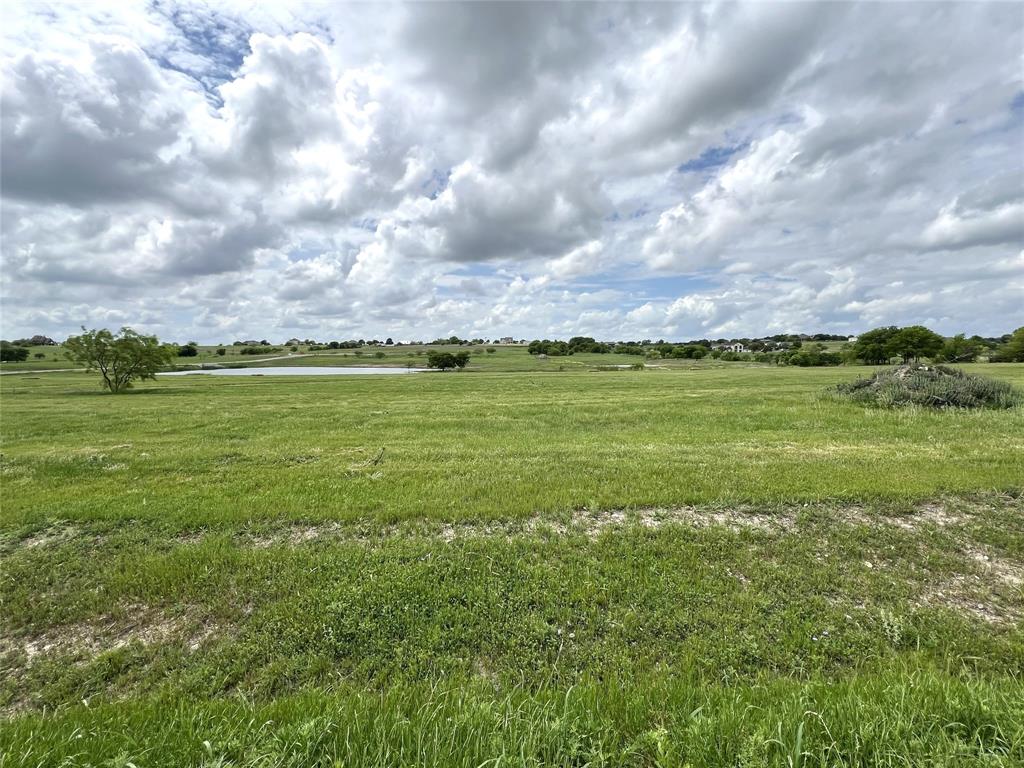 Come & build your dream home on this beautiful lot in the highly sought after Aledo ISD! Ideally located just 15 minutes to Fort Worth, 15 minutes to downtown Weatherford and 30 minutes to DFW Airport. This property offers a unique blend of natural landscapes with beautiful water features, rolling terrain, and various elevations, presenting a perfect canvas for your dream home. The property's topography provides a picturesque base for designing a home that fully utilizes the natural contours and panoramic views of the property.  AT&T Internet being installed.  Propane tanks must be buried to keep the property uncluttered.

With its proximity to both Fort Worth & Weatherford, you have the convenience of city amenities like shopping, dining, and entertainment just a short drive away, while still enjoying the tranquility and privacy that country living provides.

Lakeridge Ranches offers a rare blend of convenient location and natural beauty. Don’t miss this unique opportunity!!