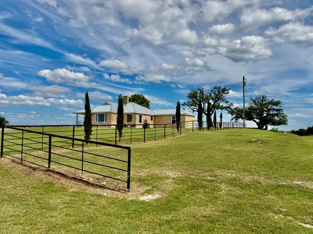 Modern Hill Country Living on 12.5 Acres in Morgan Mill, Texas
Perched atop a scenic ridgeline just west of Morgan Mill in northern Erath County, this beautifully restored 12.5-acre property combines modern luxury, classic Texas character, and breathtaking long-range views. From the home, enjoy 5 mile views to the south, creating a beautiful setting just minutes from Stephenville.
The 1,758 square-foot home has undergone a complete, top-to-bottom renovation with exceptional attention to detail. Taken down to the studs and rebuilt the right way, with new electrical wiring, plumbing, insulation, windows, doors, a standing seam metal roof, and refinished original hardwood floors, new appliances, gorgeous bathrooms and fixtures. The 3 bedroom, 2 bath home has a bright, modern interior that feels both timeless and inviting. 
The land rolls gently to away from the home with mature oak trees and a small pond. Lots of wildlife and room for horses. The barn has six stalls, while the older brick barn adds a level of character and room for equipment. Whether used for horses, 4H animals, equipment storage, or entertaining, these improvements provide endless possibilities.

Located near the historic community of Morgan Mill, an area known for its rich ranching heritage, strong sense of community, and convenient access to Stephenville, this property offers the perfect blend of rural tranquility and modern convenience. Morgan Mill traces its roots back to the late 1800s and remains one of Erath County’s most desirable country living destinations. 

Properties that combine exceptional views, a fully renovated home, horse facilities, mature oak trees, and manageable acreage are increasingly difficult to find. This is a rare opportunity to own a turnkey country property in one of North Texas’ most sought-after rural communities.