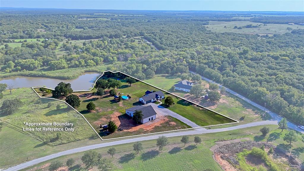 Modern Lakefront Living on Lake Nocona – Main Residence , Guest House with Shop & Pool on 2.65 Acres. Enjoy the perfect blend of luxury, comfort, and income potential with this stunning waterfront property on Lake Nocona! Built in 2021, this beautiful 3-bedroom, 2-bathroom 1530 sq ft home sits on 2.65 acres and offers everything you need for full-time living or a weekend getaway. Inside, you'll find a spacious open layout featuring a wood-burning fireplace, a stylish kitchen with leathered granite countertops, and a garage for added convenience. The primary suite includes a modern walk-in shower, while the guest bathroom boasts a relaxing soaker tub. Step outside to your private lakeside oasis, complete with a cabana, above ground pool, and plenty of space to entertain or unwind. Need extra room for visitors or rental income? The fully furnished 2-bedroom, 1-bath 1000 square foot guest house built in 2022 is ideal for guests or Airbnb income. 

For those who need space for hobbies, business, or storage, the property also includes 1,385 sq. ft. of shop, garage or storage area. 

This rare property offers lakefront living, privacy, and potential—whether you're looking for a peaceful retreat, multi-generational setup, or income-producing investment. Don’t miss your chance to own a slice of paradise on Lake Nocona.
