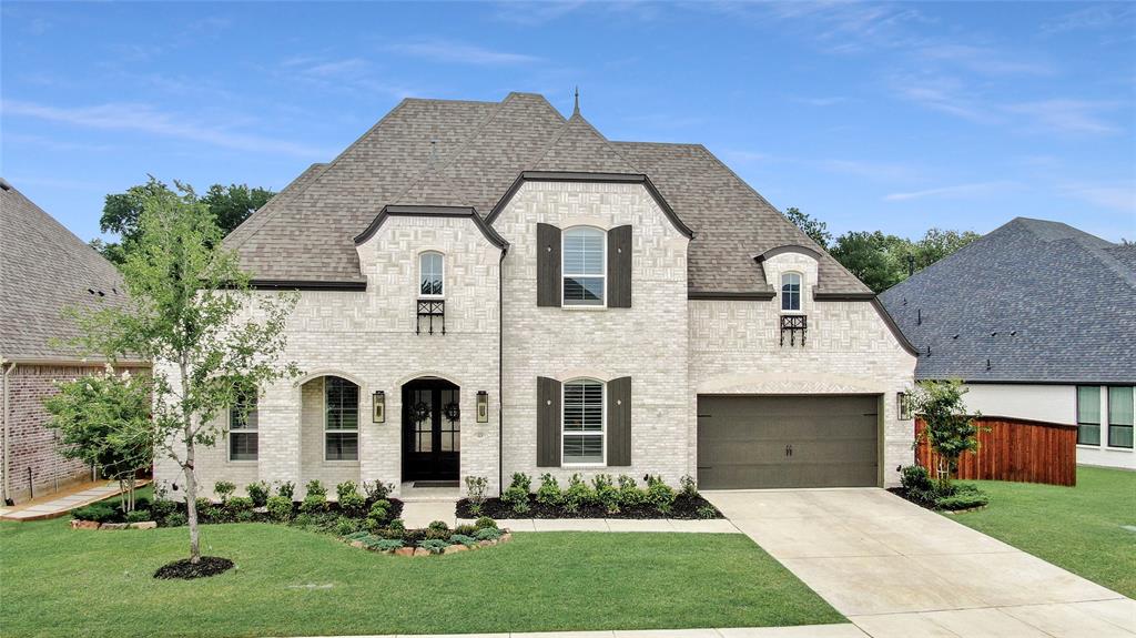 ONE OF THE MOST EXPANSIVE AND LUXURIOUS HOMES IN TRINITY FALLS!!! Exquisite Highland home built in 2025, nicely positioned on a cul-de-sac with tranquil views of a protected, heavily treed backdrop. Offering 5 bedrooms each with their own on suite bathroom, 2 half baths, and a 3-car garage. This exceptional residence blends sophisticated design, elevated finishes, and everyday comfort. Thoughtfully curated architectural details are showcased throughout, including custom wood beams in the office, dining room, and family room, adding warmth, character, and timeless elegance. The designer kitchen is a true statement space, featuring a herringbone marble backsplash extended to the ceiling, expanded cabinetry with accent lighting, a beautiful setting for both entertaining and daily living.  Plantation shutters throughout the entire home provide a polished, classic finish while enhancing privacy and natural light. The outdoor living space is equally impressive, with an extended covered patio and fireplace overlooking the serene backyard and protected treed views — an ideal setting for relaxing evenings or elegant entertaining.