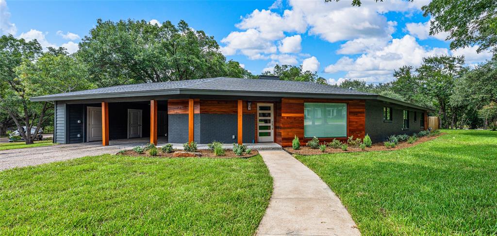 “Sometimes you wanna go…” to a place where the setting is just as stunning as the home itself. Welcome to Lake Oaks—an established neighborhood known for its beautiful canopy of grand oak trees and peaceful, walkable streets, and neighbors who still wave hello. Nestled in its heart, this completely reimagined 2,448 sq. ft. home is a true standout.

Taken down to the studs and rebuilt with care, this 3-bedroom, 2-bathroom home features all-new plumbing, electrical, HVAC, spray foam insulation, roof, and drywall—every inch thoughtfully upgraded. Inside, a bright, open-concept layout is elevated by designer finishes and modern style.

The showstopping kitchen boasts quartz countertops, an oversized island, custom cabinetry, and a sleek appliance suite that ties it all together. The primary suite is absolutely massive with space for a reading nook or lounge area, plus a spacious walk-in closet and stunning bathroom with double vanities, modern tile, and a frameless glass shower.

An enclosed sunroom—lined with windows and bathed in natural light—offers endless flexibility: second living space, plant haven, home gym, or playroom with views of the beautiful backyard. Step outside and you'll find mature trees, room to garden, entertain, or even add a pool--whatever your lifestyle calls for.

Just minutes from Baylor University, downtown, and Waco’s best shopping and dining—yet tucked into one of its quietest corners—this home offers the perfect blend of high-end design, quality craftsmanship, and everyday comfort.

You can try to compare this to others all you want, but Lockwood is Lockwood.  Thoughtfully rebuilt, beautifully styled, and truly move-in ready--this one's something special.  Book your showing today before it's gone.