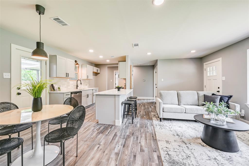 This beautifully renovated home is ready for you to move in and enjoy! Every detail has been thoughtfully upgraded, including new plumbing, electrical, and floors. New sheetrock, freshly textured walls, and a coat of new paint throughout give this home a modern and clean feel. The kitchen boasts brand-new cabinetry, stunning quartz countertops, and stainless steel appliances, including tons of counter space– perfect for the home chef. Both bathrooms have been completely remodeled with new vanities and tile updates, creating a fresh and stylish space. Step outside on the huge covered patio deck overlooking a fenced backyard, ideal for entertaining or relaxing. The property also features updated windows and doors, ensuring energy efficiency and curb appeal. A new roof will keep you protected and dry! Don't miss out on this move-in-ready gem! Schedule a tour today and make it yours!